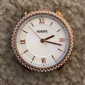 Rose gold Fossil watch face